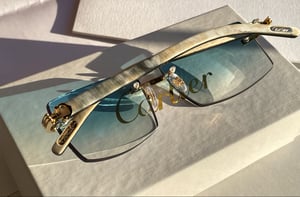 Image of AUTHENTIC CARTIER CT0286O 003 - [MIXED HORN] CUSTOM LENS 007