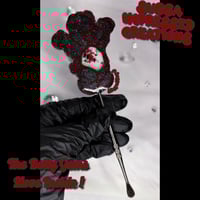 Image 2 of “Strange” Care Bear Tool