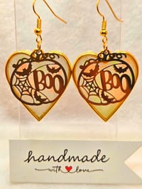 Image 4 of Handcrafted Resin Glow In The Dark Heart Shaped Pumkin " Boo" Earrings 