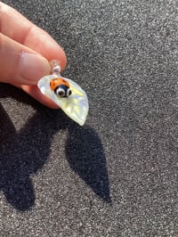 Image 4 of Purple Leaf W/ Orange Ladybug pendant 