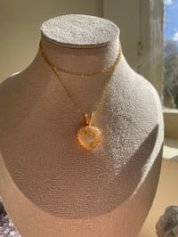 Image 2 of Gold Glowy Flower Agate Heart Crystal Necklace