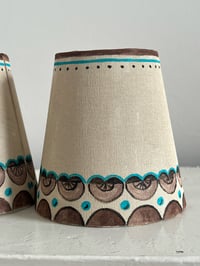 Image 2 of "The Edmund Brothers" - Matching Pair of Hand Painted Linen Lampshades, Candle-clip