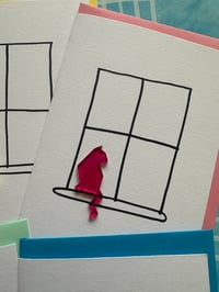 Image 6 of Cat Sitting In A Window