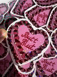 Image 2 of butt slut cake pink holographic sticker