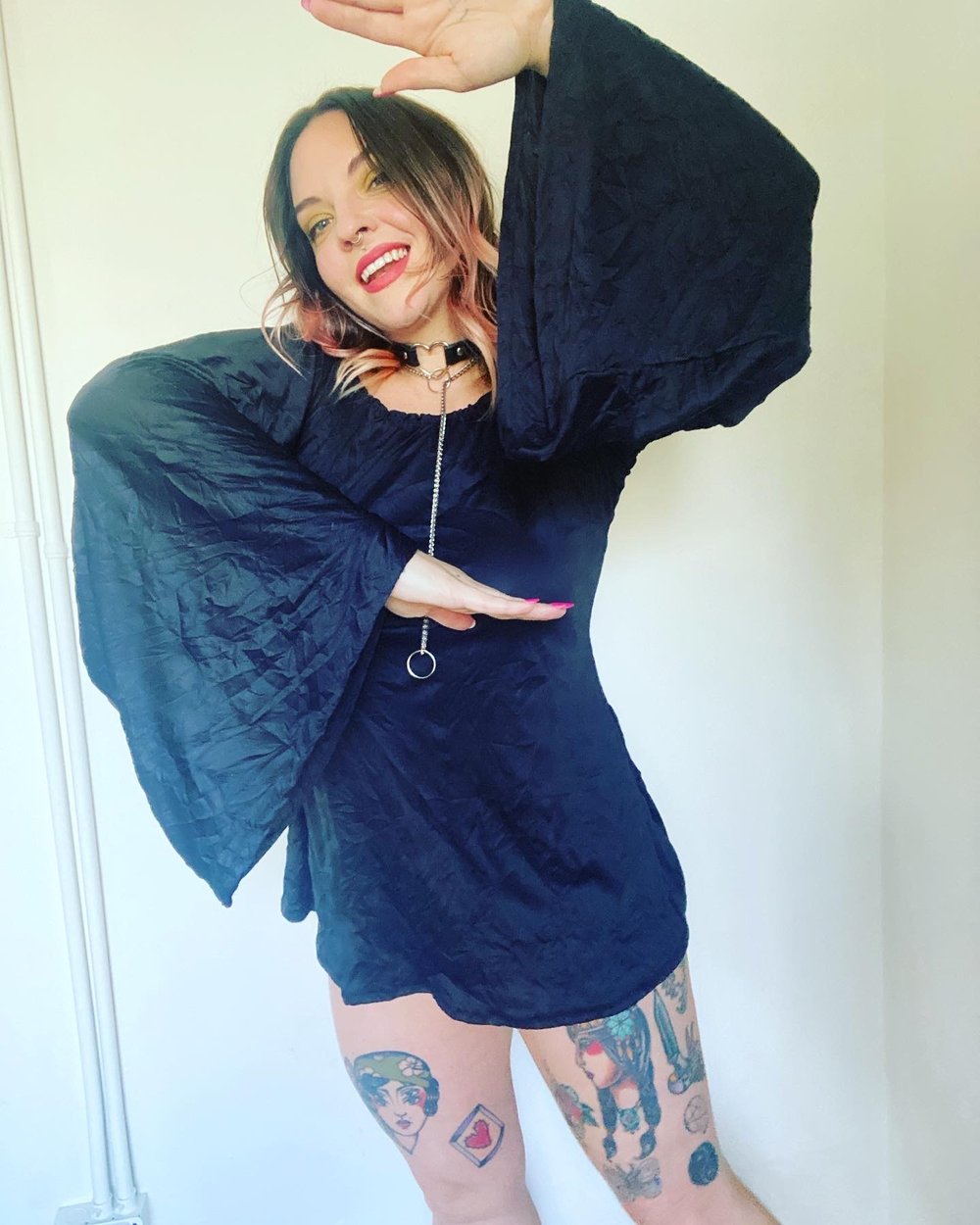Image of bell sleeve witch dress