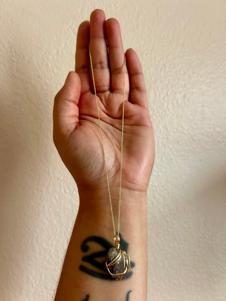 Image of Apatite with Actinolite inclusions