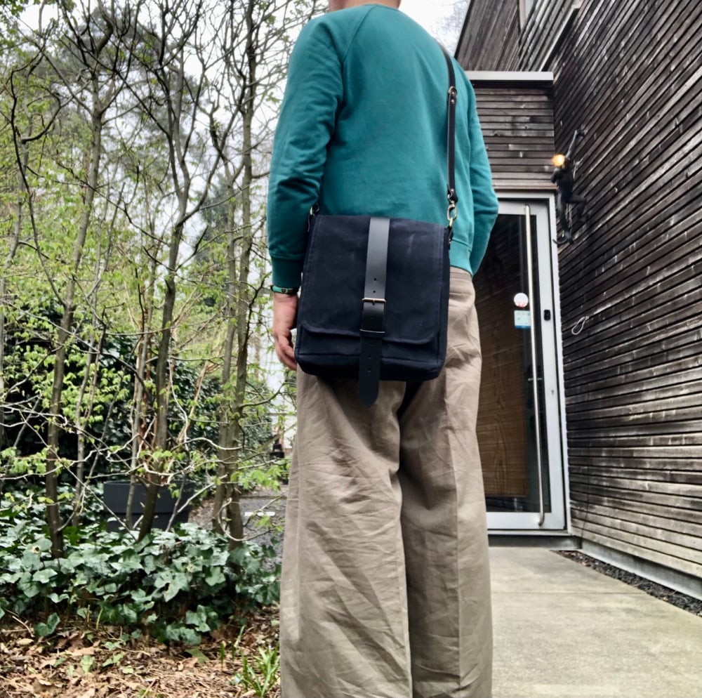 Image of Mens messenger bag in waxed canvas with leather adjustable shoulder strap and closing flap