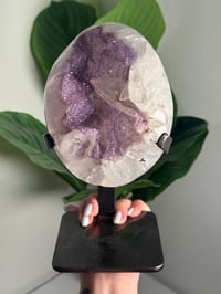 Image 13 of LAVENDER DRUZY QUARTZ EGG WITH RAINBOW FILLED CALCITE POINT ON A STAND -URUGUAY-