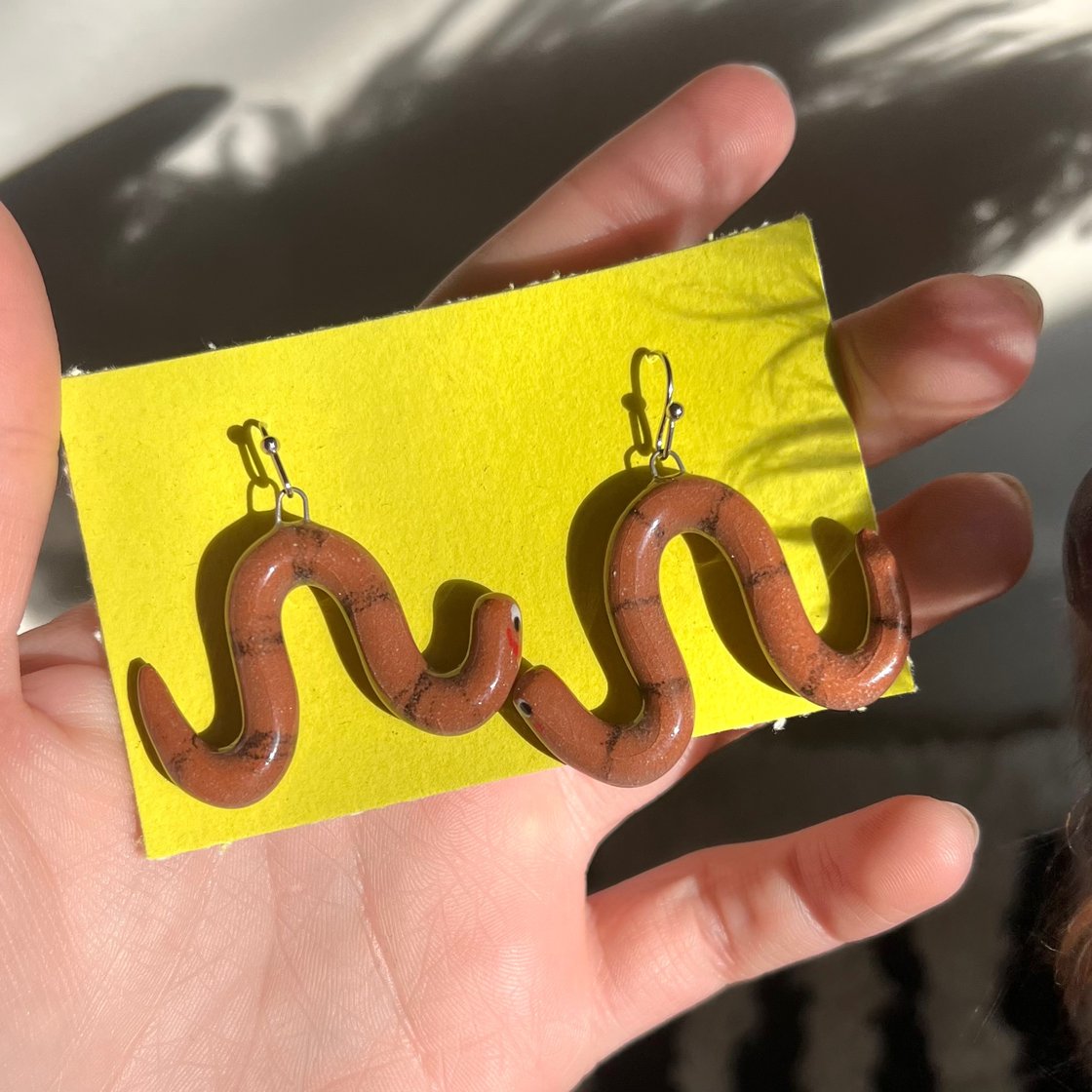 Image of ceramic worm earrings - red clay