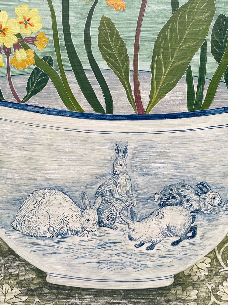 Image of Spring flowers in a rabbit bowl 