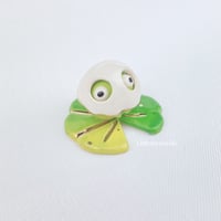 Image 3 of Silly Frog on lily pad with ghost mask ceramic figurine