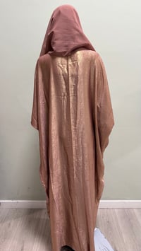Image 2 of Korean shimmer fabric Flared sleeve abaya rose gold it comes with a matching scarf 