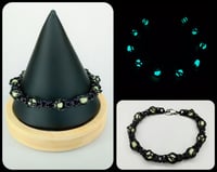 Image 1 of Black + Aqua Glow-in-the-Dark Capture Sphere Bracelet