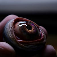 Image 3 of Custom Swappable Phone Grip for smartphones, reflective pupil, green glow in the dark