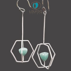 White hexagonal cages with trillion stone