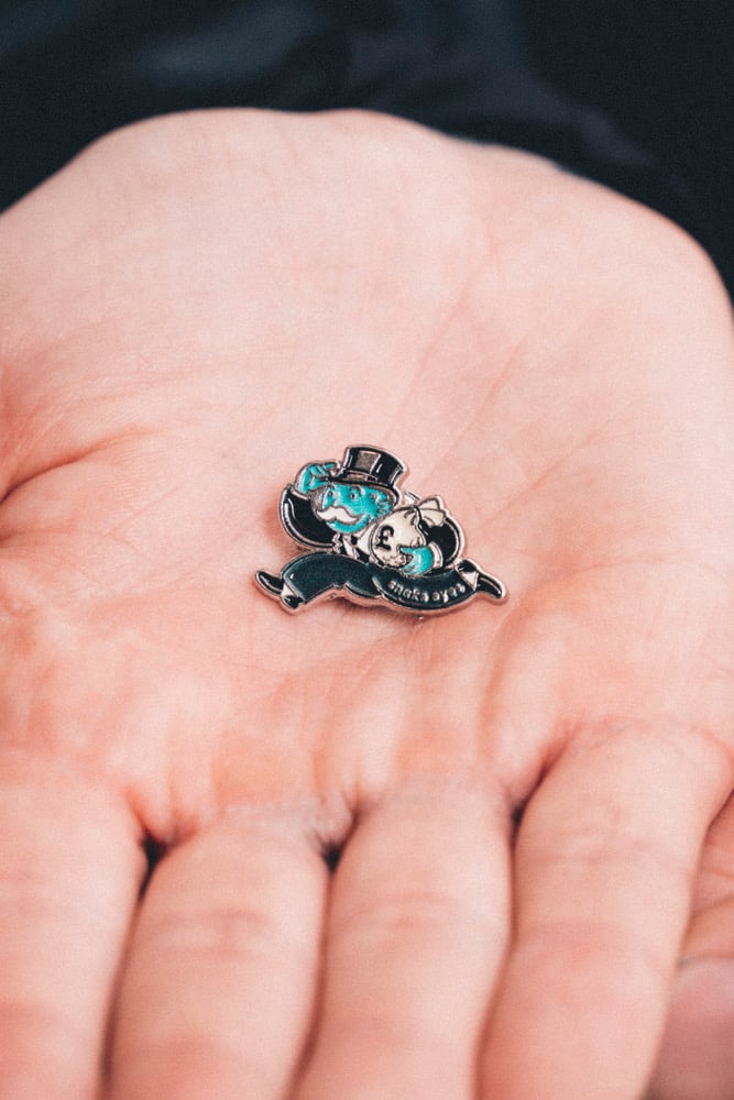 monopoly man pin