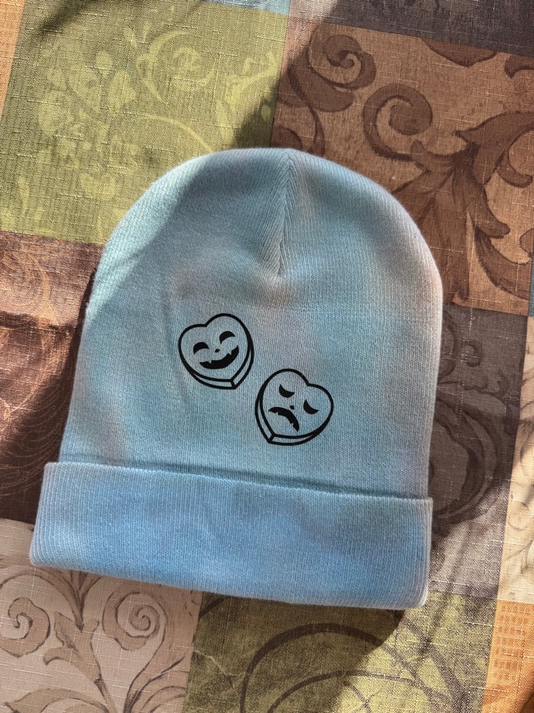 Image of Happy and sad pumpkin heart beanie 