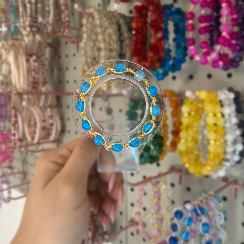 Image of Gold Ring Darker Blue
