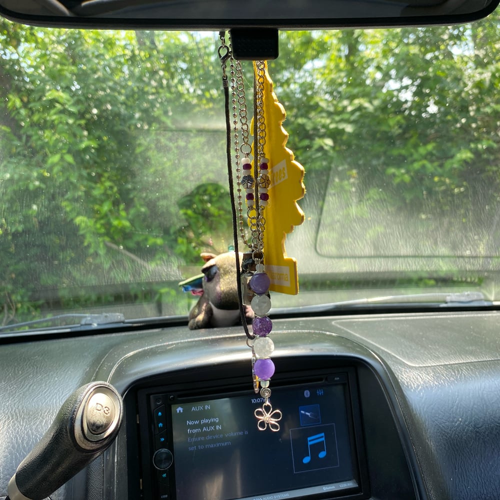 Image of purple flowers car beads
