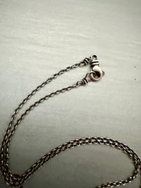 Image 12 of sterling silver moon pendant with brave inscription and green tourmaline