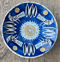 Image 1 of Medium blue , mustard and black bird earthenware bowl 