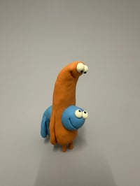 Image 10 of A blue thing peeking out of a brown thing 2