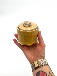 Image 1 of yellow dot jar