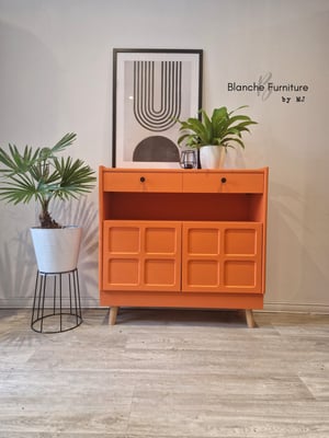 Image of Slim / Narrow hallway Sideboard in Tuscan Orange with black knobs.