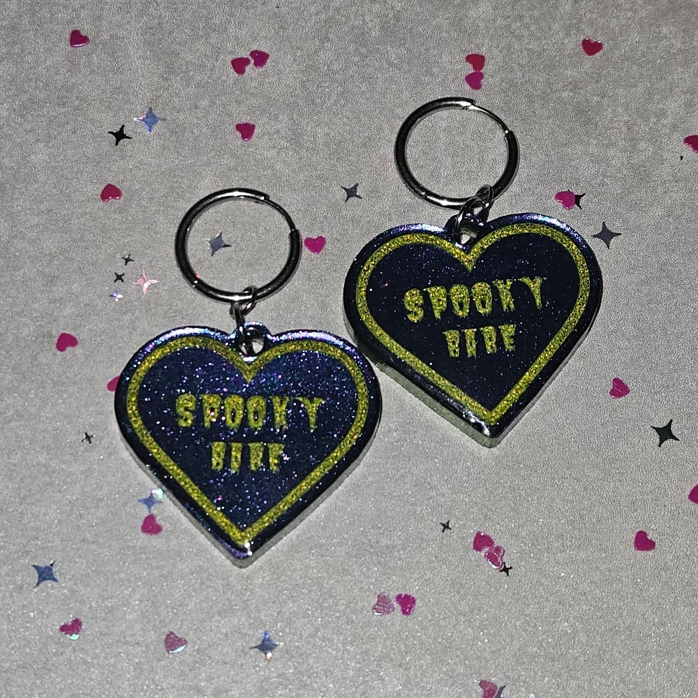 Image of Spooky Babe Heart Earrings: Purple/ Blue Color-shift w/ Chartreuse Lettering