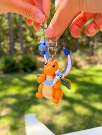 Image 2 of magnetic charm commission!