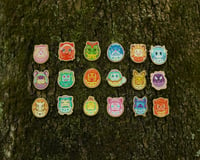 Image 1 of Pokégotchi wood pin