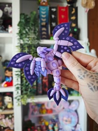 Image 1 of Dragón bebe morado llavero
