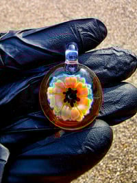 Image 1 of psychedelic sunflower pendant with uv reactive center dots 🌼🧡🖤