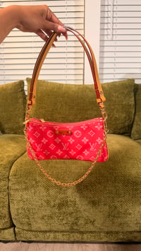 Image 1 of Pink Pochette Liv Monogram bag 