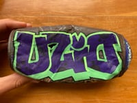 Image 1 of Busted UZIO Spray Can