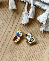 Image 5 of Alice in Wonderland themed enamel pins!