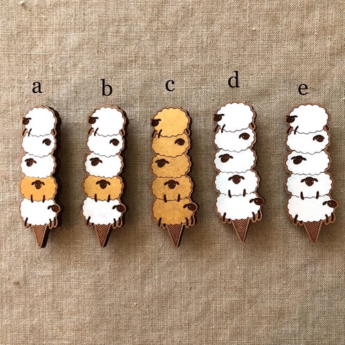 Image of handpainted wood sheep stack cone brooches