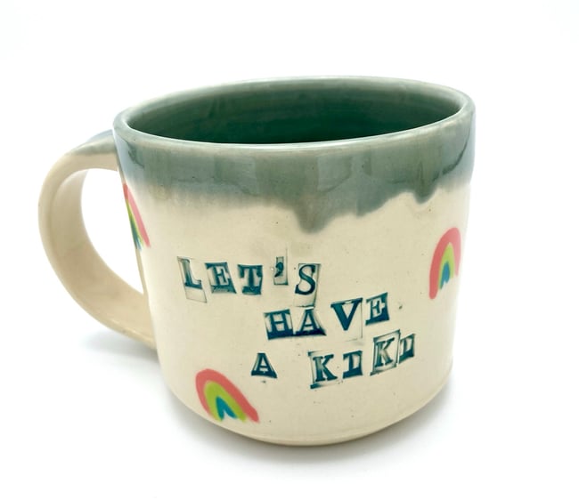 Let’s Have a Kiki Mugs