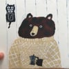 Small square print featuring a bear with coffee