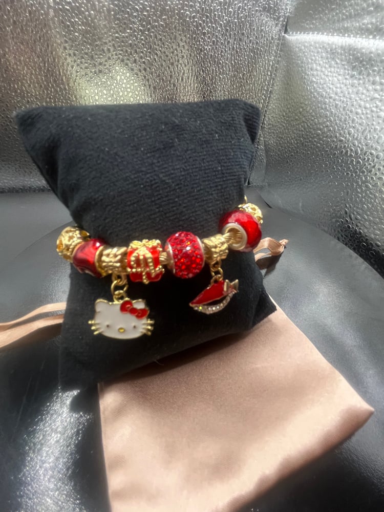 Image of Gold bracelet Hello Kitty Red