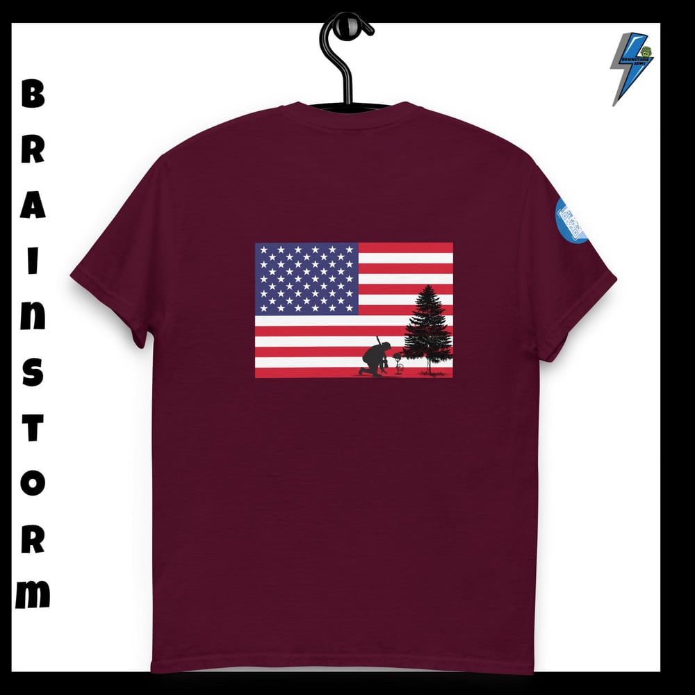 The American flag with a soldier kneeling classic tee