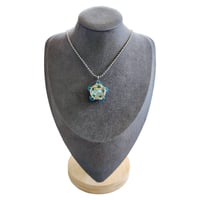 Image 1 of Glacier Blue Asteris Capture Crystal Pendant 