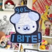 Image 2 of bite sticker