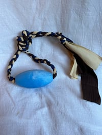 Float and plaited braid Bag charm 