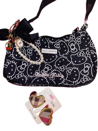 Hk black purse with heart hair clip