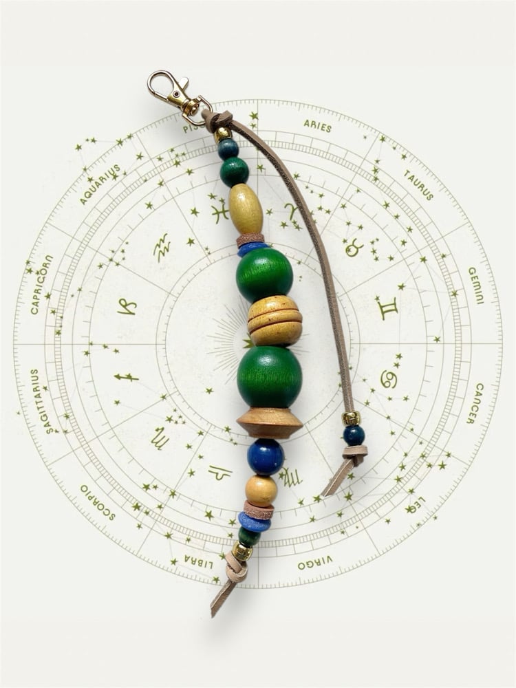 Image of GEMINI RISING BAG CHARM