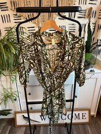 Image 1 of green tie top