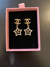 Gold Cc. Inspired star earrings 