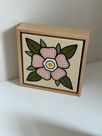Framed pink flower on canvas 