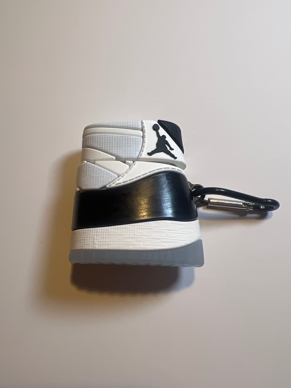 Image of black and white AirPod case